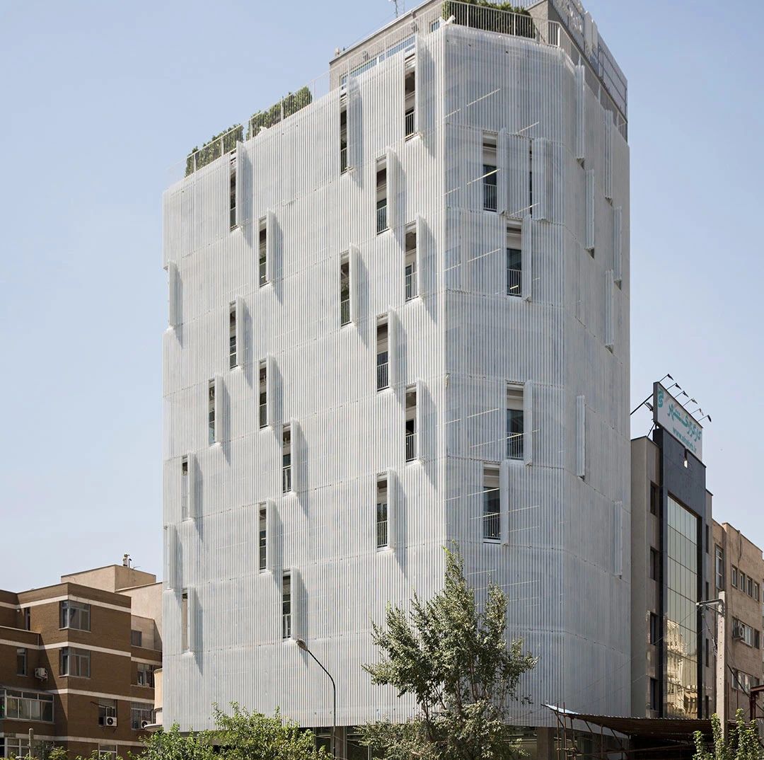 A building draped in a white veil